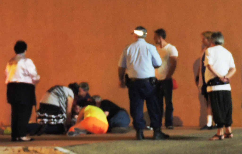 INCIDENT: A woman lies injured on Ocean Pde after a party. INCIDENT: A woman lies injured on Ocean Pde after a party.